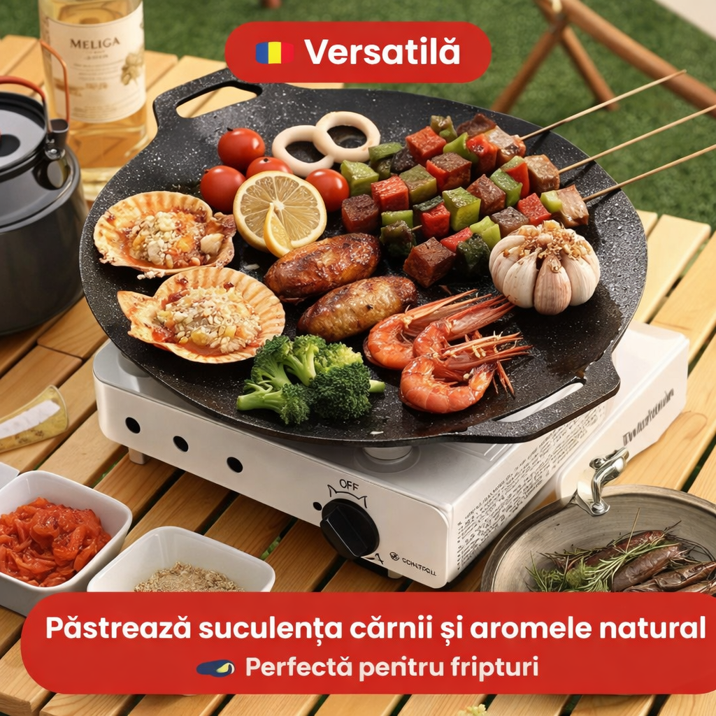 Plita plină cu carne, legume și fructe de mare, pe un aragaz portabil, în aer liber