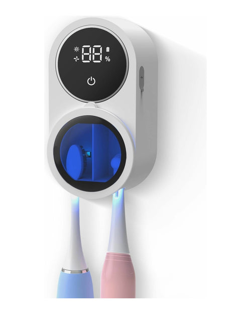 Sterilizator UV de perete, cu capacul deschis și două periuțe de dinți
