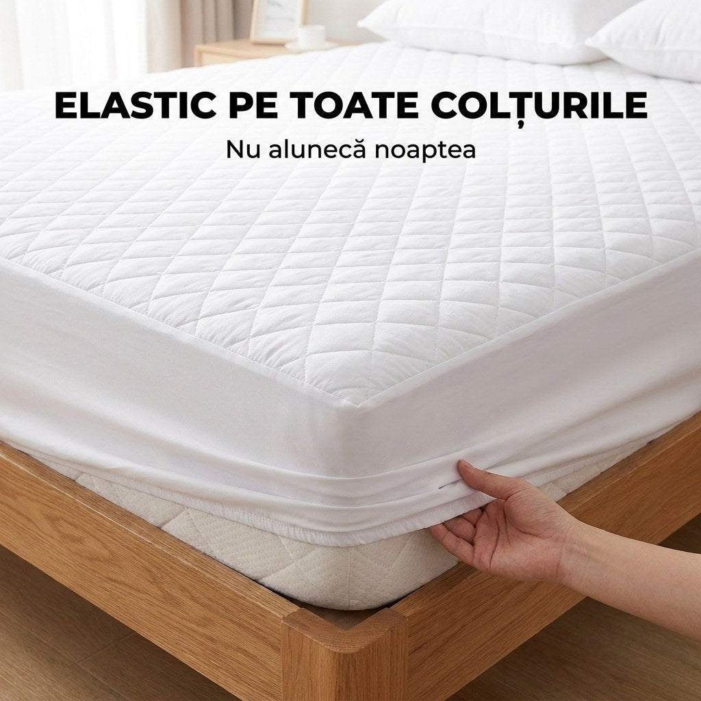 Colțul unui așternut impermeabil alb, cu elasticul prins sub saltea