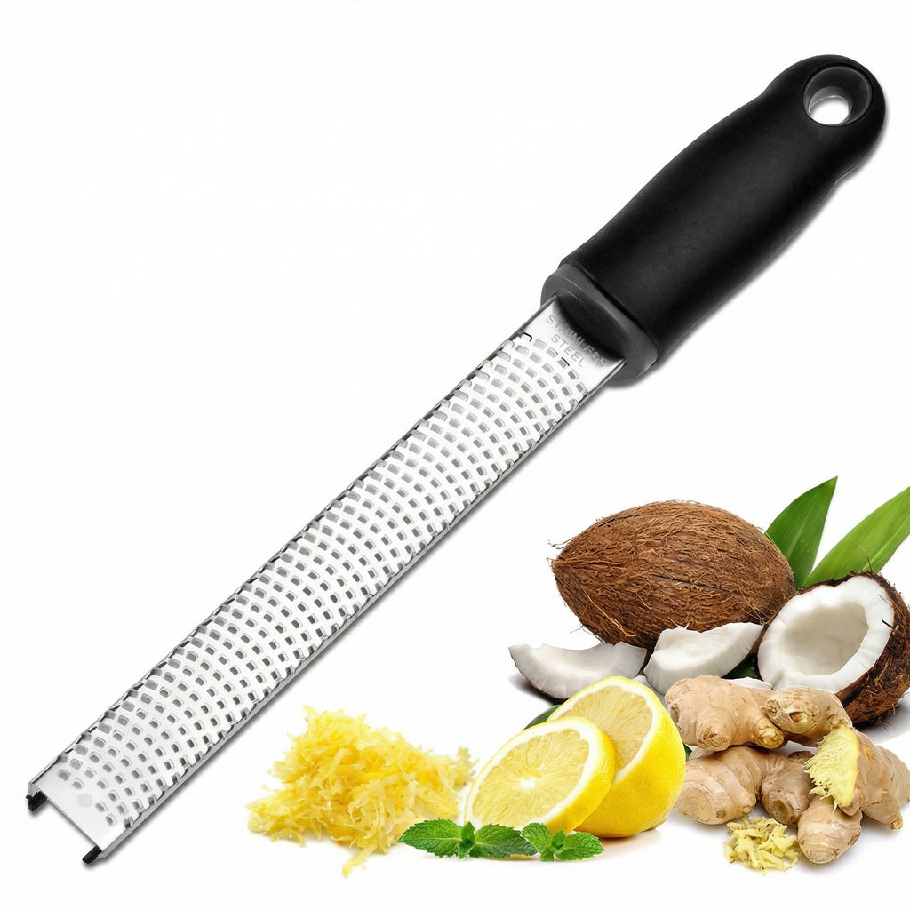 Răzătoarea lângă coajă de lămâie rasă, lămâie, nucă de cocos și ghimbir